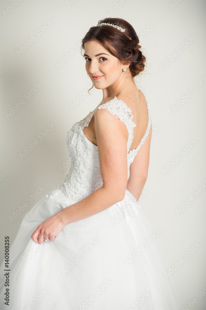 Smiling bride holding big wedding bouquet Smiling bride holding big wedding bouquet