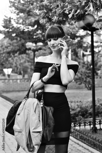 Woman talking over phone © mariematata