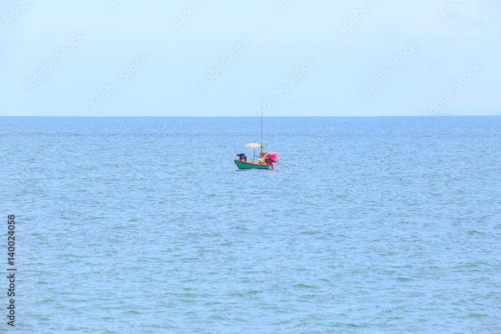 alone or single boat of fisherman on the sea or ocean. alone or single boat of fisherman on the sea or ocean.