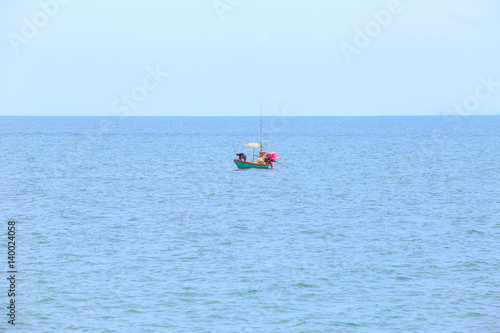 alone or single boat of fisherman on the sea or ocean.