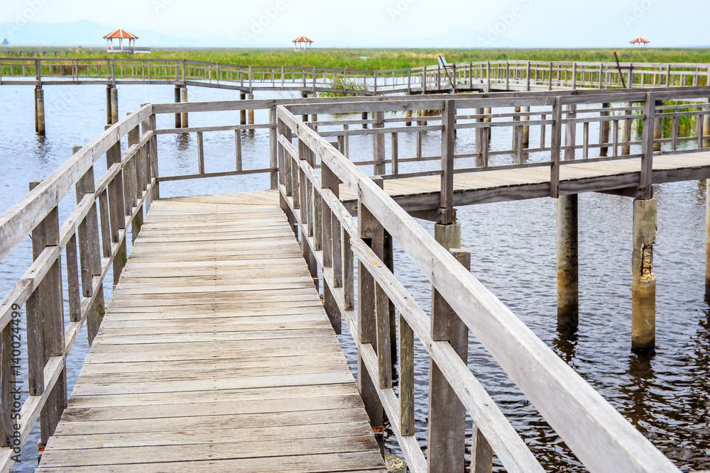 walkway or walkpath with old pavilion in lake of Khao Samroiyod National Park, Prachuap Khiri Khan, Thailand.