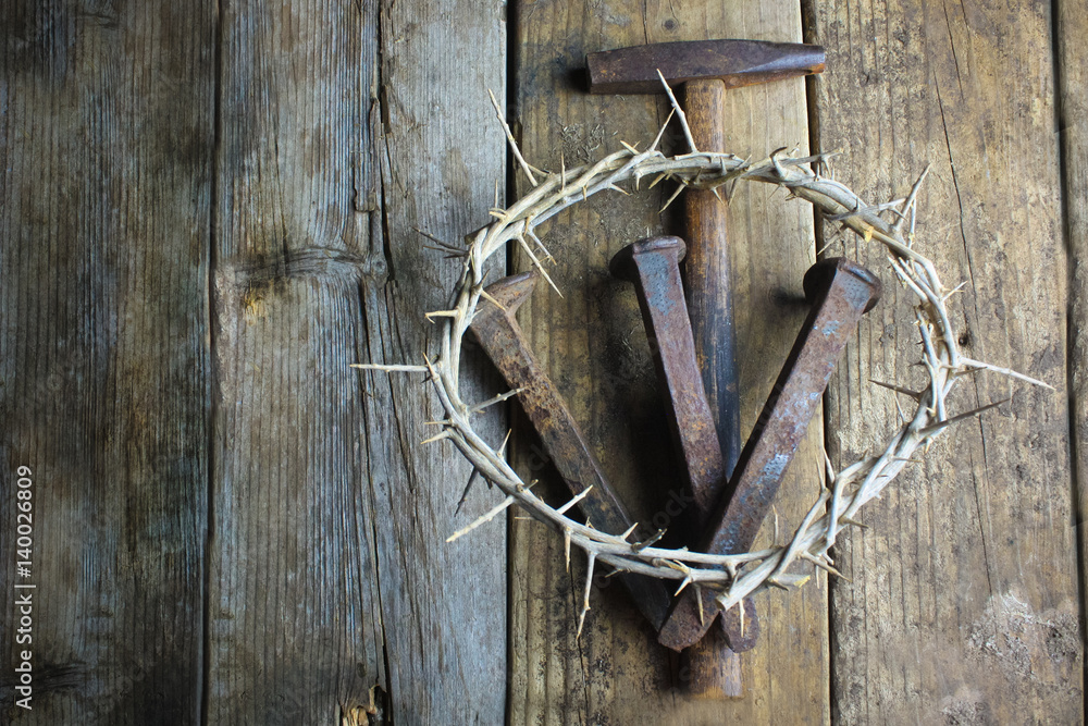 Crown of Thorns and Three Nails With Hammer on Wooden background Stock ...