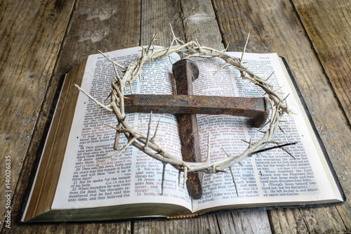 Crown of Thorns and Nails on Open Bible