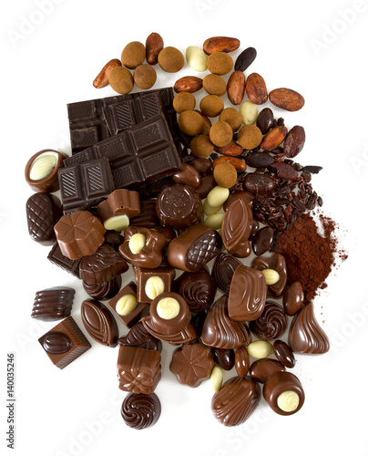 cocoa beans and assortment of chocolate candies