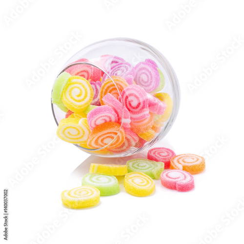 Jelly sweet flavor fruit candy dessert colorful in glass jars on white background.