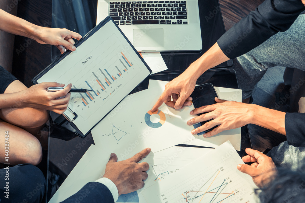 businessmen meeting, Business partners discussing hand pointing at business documents and ideas at meeting businessmen meeting, Business partners discussing hand pointing at business documents and ideas at meeting