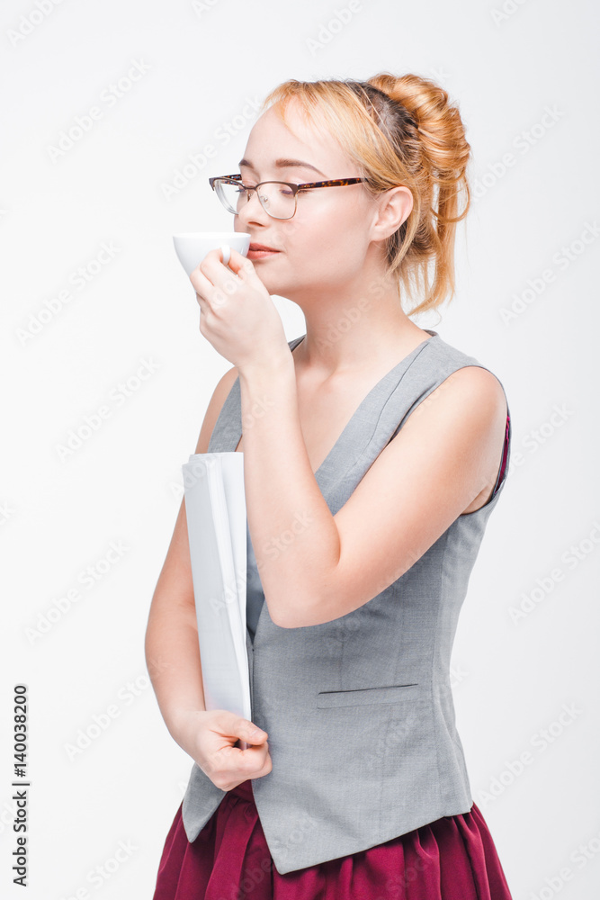 Woman with white cup of coffee enjoys morning delightful aroma. Healthy lifestyle, harm and benefits of caffeine.