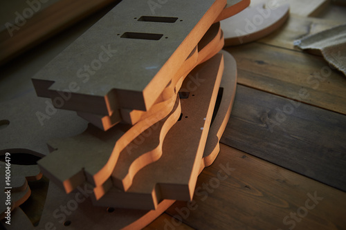 Product parts cut on machine. Pressed MDF, sawmany material