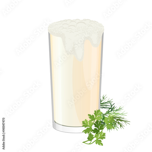 Glass of ayran with dill and parsley herbs isolated on white.