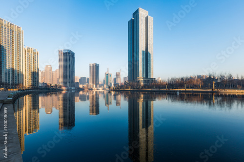 River And Modern Buildings Against Sky in Tianjin China.