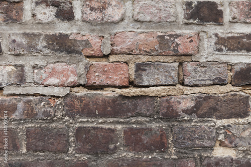 Old weathered brick wall