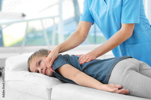 Physiotherapist working wit...