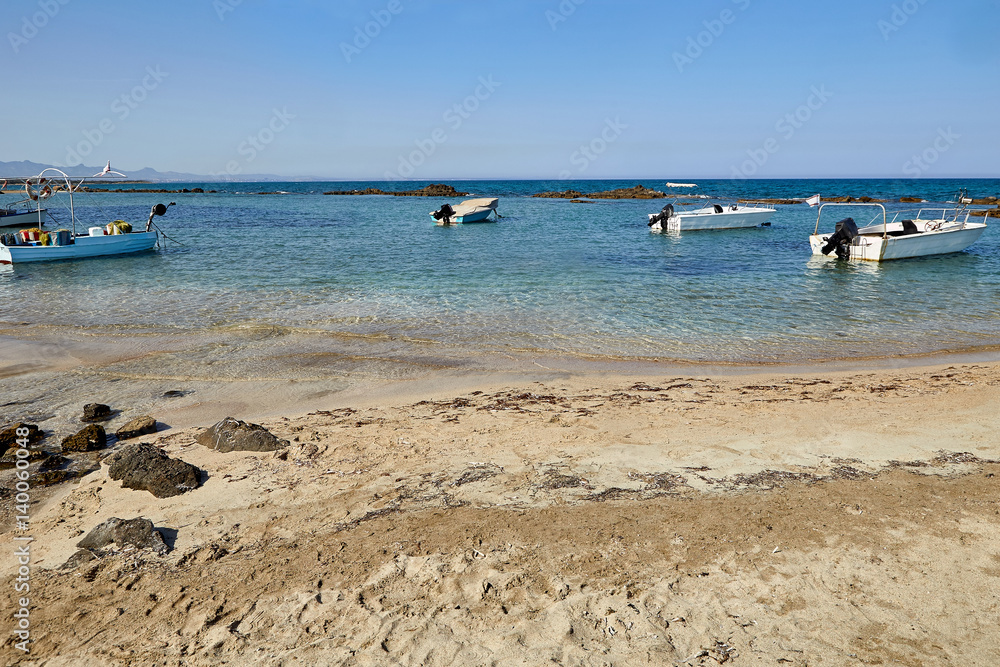 beautiful landscape of blue sky and sea or ocean water beach with stone and boats sunny outdoor on natural background