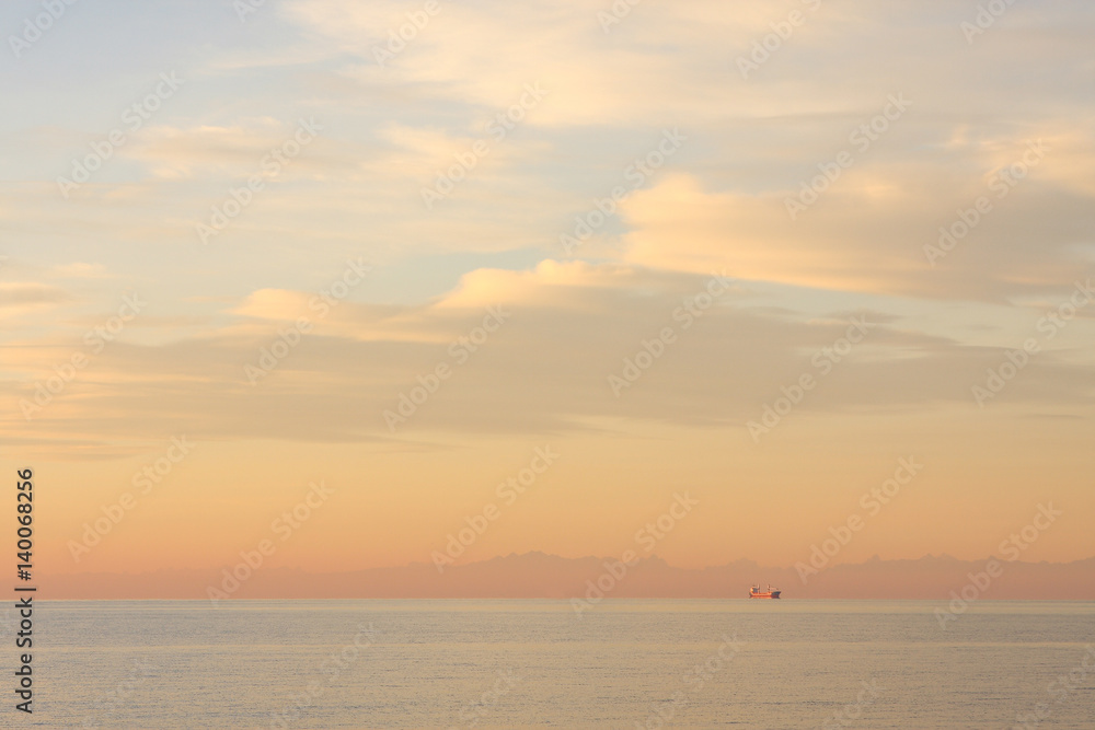 Seascape with a cargo ship - Trieste Bay, view of Italy from Slovenia