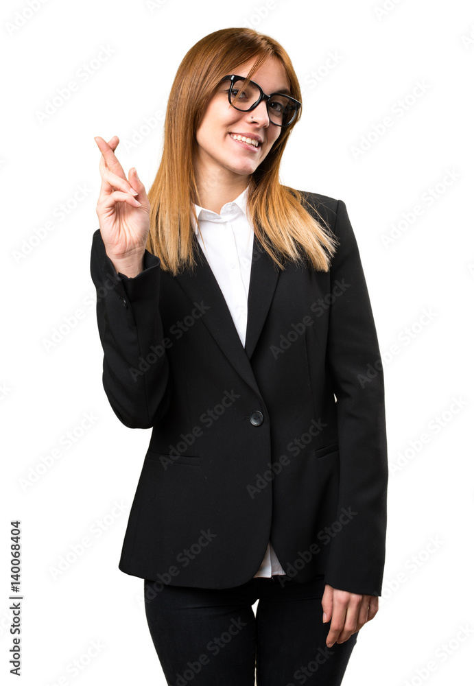 Young business woman with her fingers crossing Young business woman with her fingers crossing