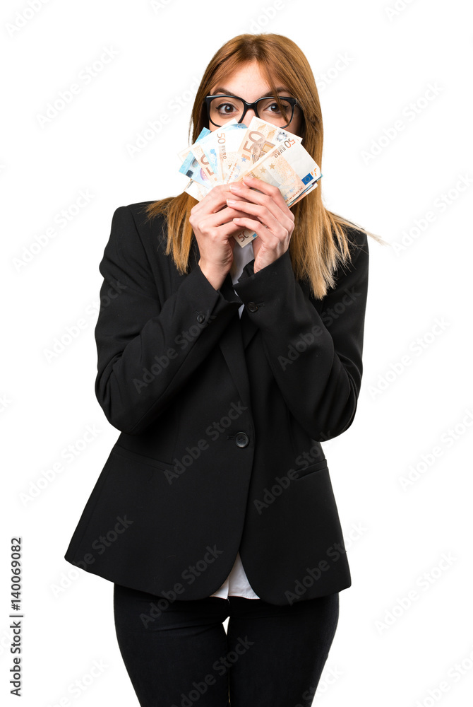 Young business woman taking a lot of money Young business woman taking a lot of money