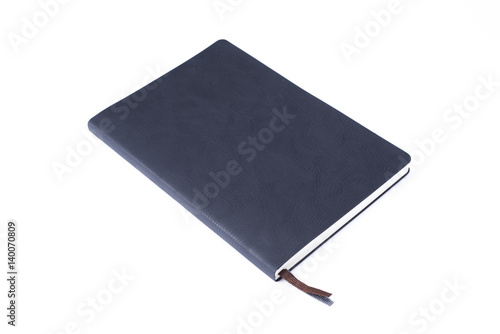Black leather notebook isolated on white background.