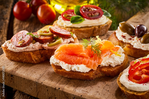 Fényképezés Delicious fresh smoked salmon canape