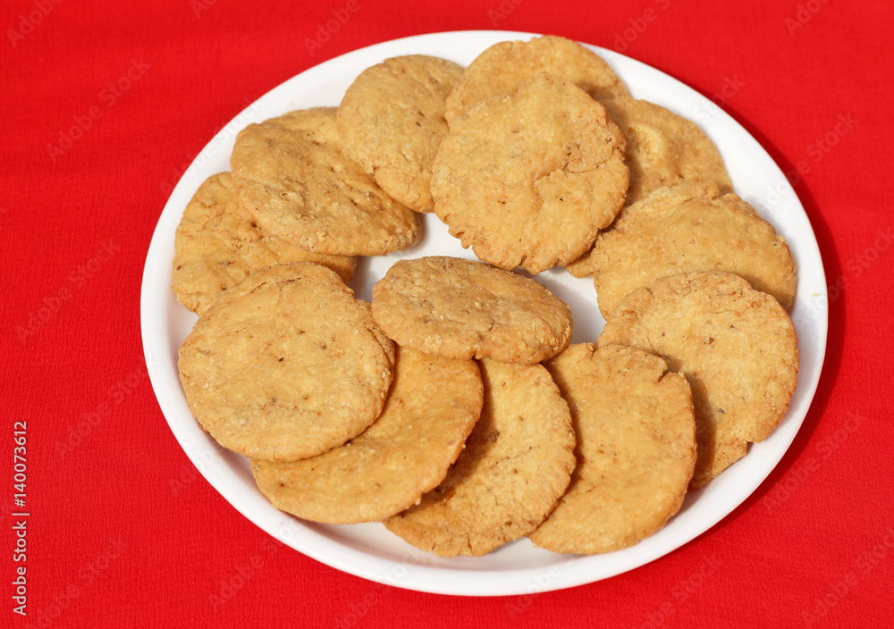 Delicious Tasty and Yummy Indian Mathari made with fine wheat flour, a traditional snack of Indian homes. Delicious Tasty and Yummy Indian Mathari made with fine wheat flour, a traditional snack of Indian homes.