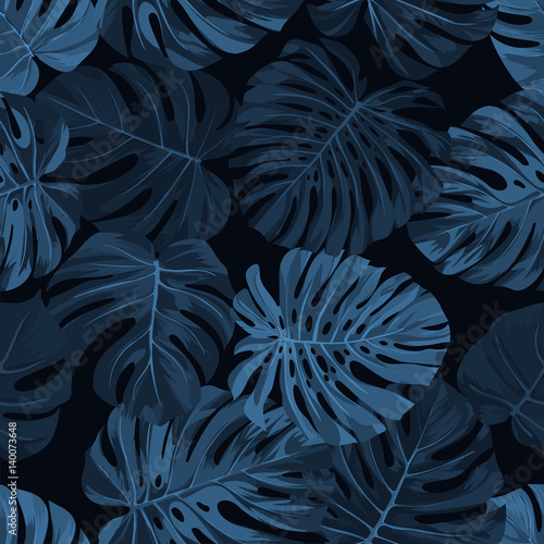 Dark indigo vector pattern with monstera palm leaves on dark background. Seamless summer tropical fabric design.