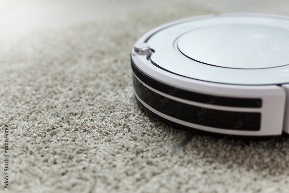White robotic vacuum cleaner White robotic vacuum cleaner