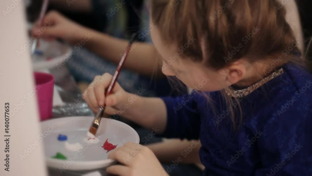 little girl blonde in class drawing pictures little girl blonde in class drawing pictures