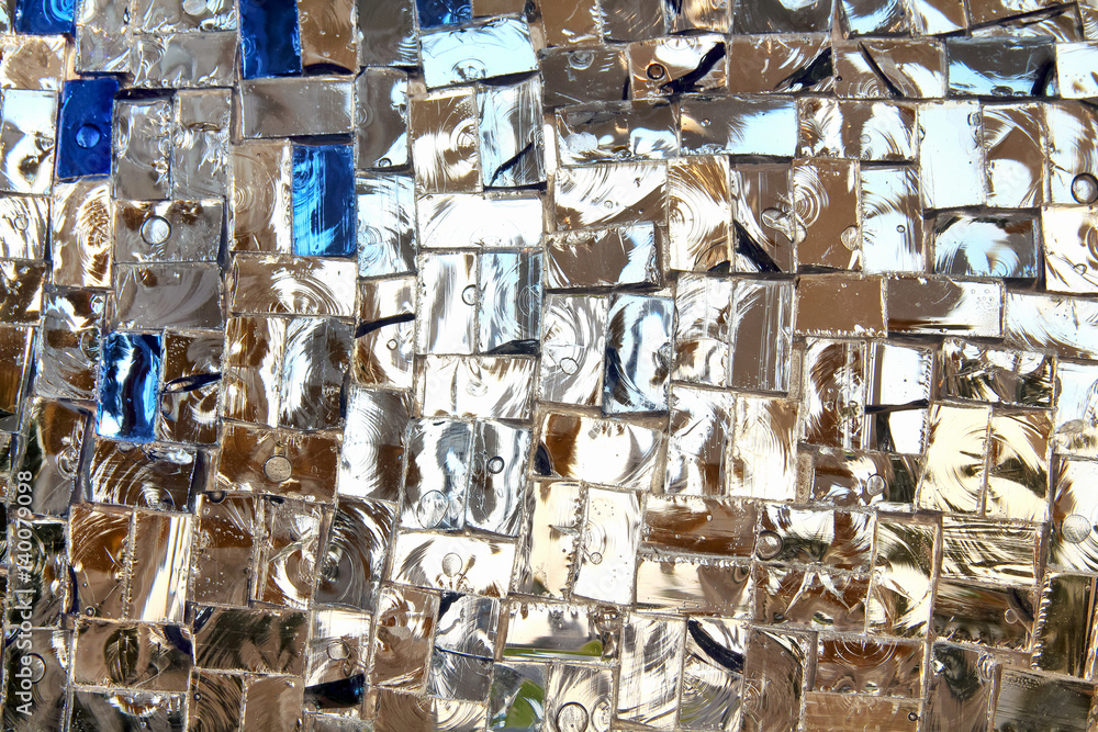 Detail of a beautiful crumbling abstract glass mosaic decoration. Stained-glass window. Leaded pane or panel. Glass painting. Decorative background. Selective focus. Closeup macro view. Horizontal.