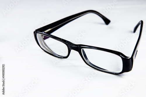 Black glasses, isolated on white background, close up