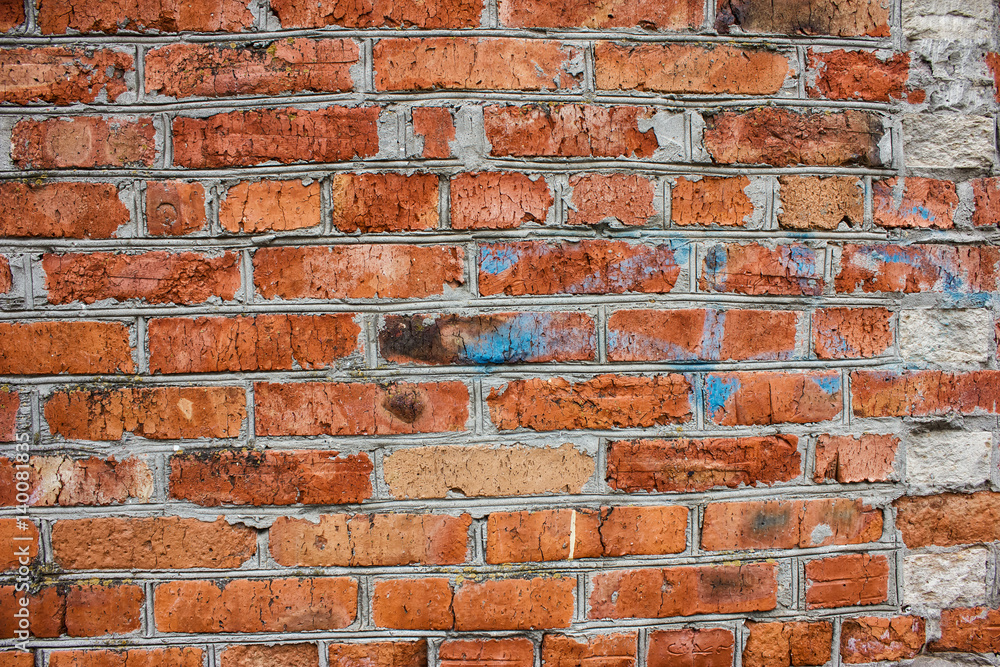 Fototapeta premium Wall of old red bricks. Background