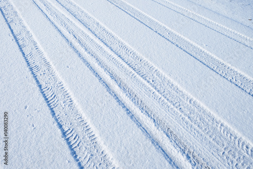 traces of cars on the freshly fallen snow