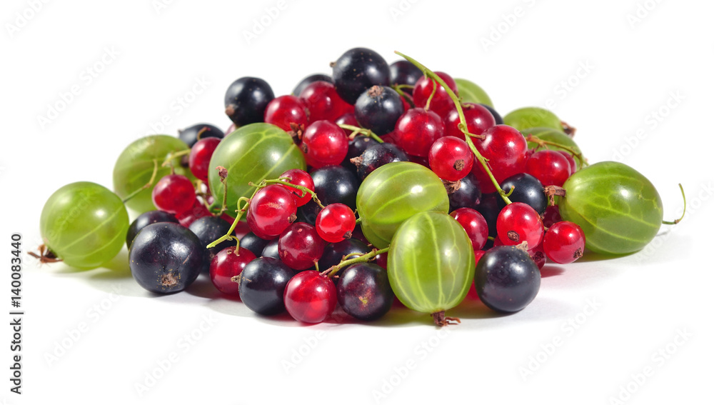 Heap of various kinds of fresh berries on a white Heap of various kinds of fresh berries on a white