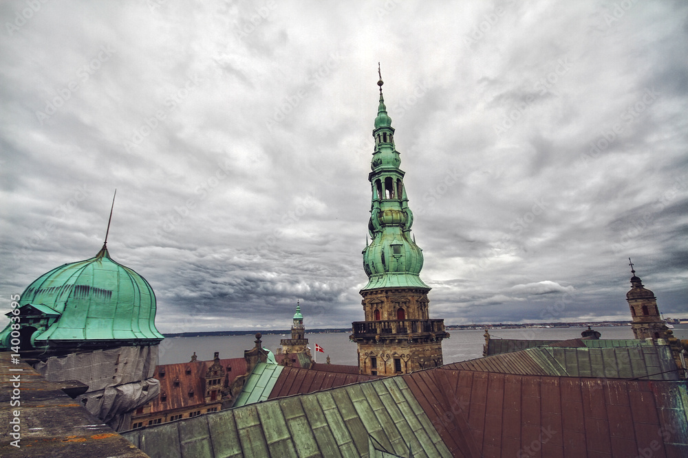 Obraz premium Tower of Kronborg castle and view of harbor