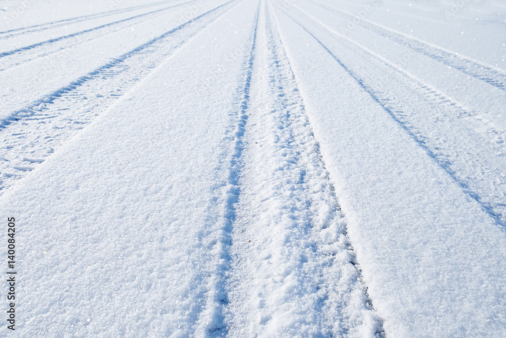 traces of cars on the freshly fallen snow traces of cars on the freshly fallen snow