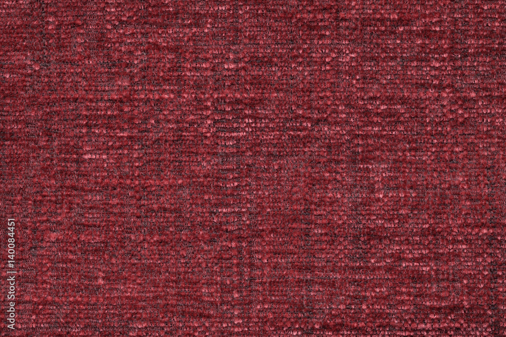 Red fluffy background of soft, fleecy cloth. Texture of textile closeup Red fluffy background of soft, fleecy cloth. Texture of textile closeup