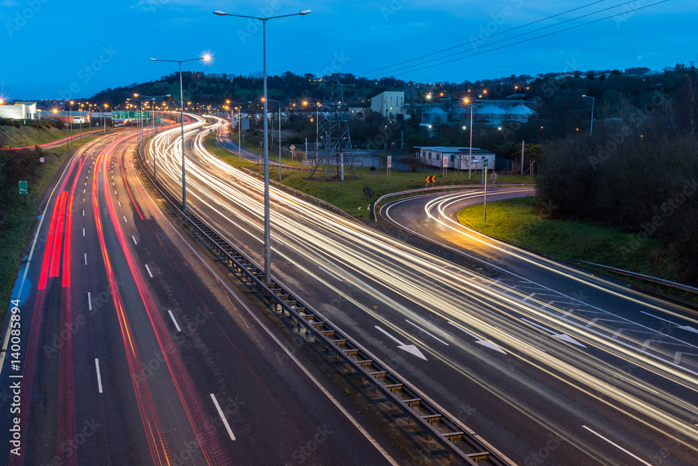 Light trails on motorway during evening rush hour Light trails on motorway during evening rush hour