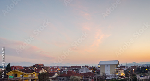 Small city under sunset © goran97