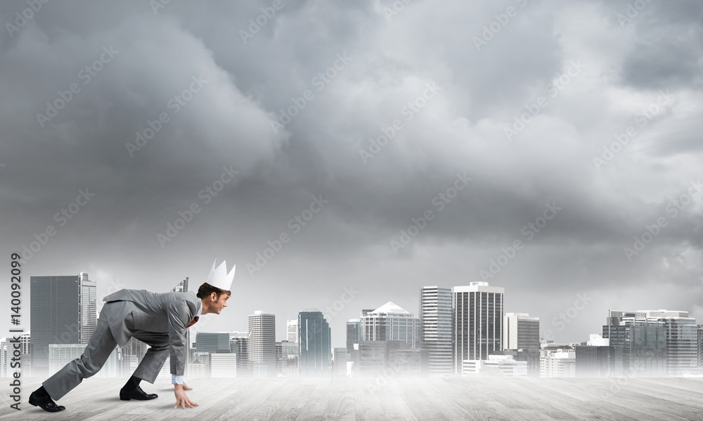 King businessman in elegant suit running and modern cityscape at background King businessman in elegant suit running and modern cityscape at background