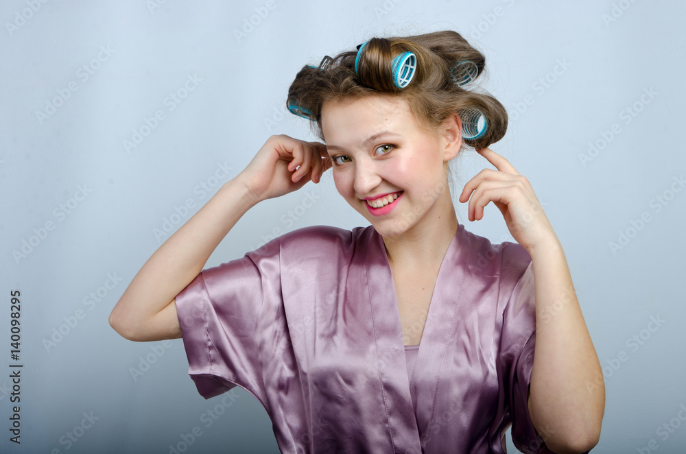 beautiful girl in hair curlers beautiful girl in hair curlers