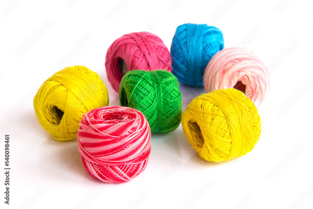 Bright coils of yarn StockFoto Adobe Stock