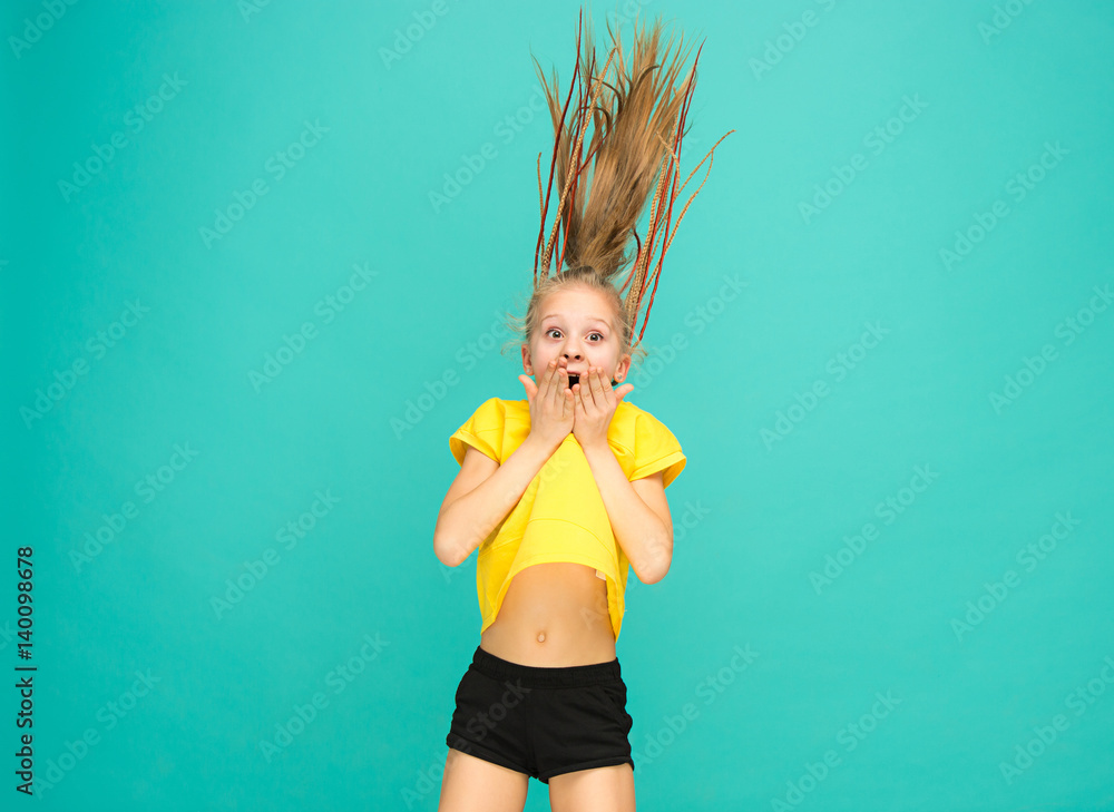 The face of playful happy teen girl The face of playful happy teen girl