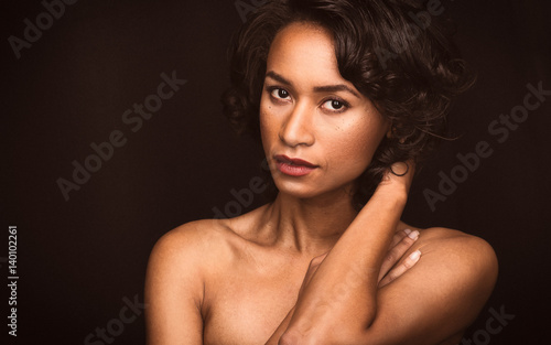 Golden Glow portrait of an African American Female with beautiful freckles