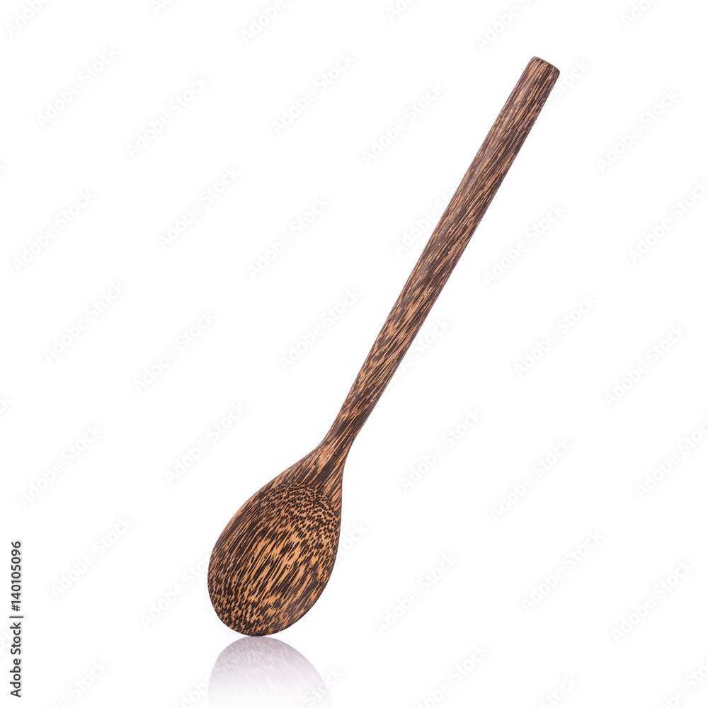 Brown spoon made from palm wood. Studio shot isolated on white Brown spoon made from palm wood. Studio shot isolated on white