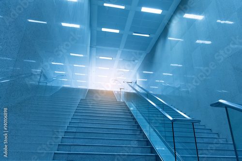 stairway of modern office building, blue toned images.