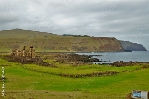 Long shot of a row of Moai sculptures at the Tongariki platform in Easter Island, Rapa Nui, Chile, South America