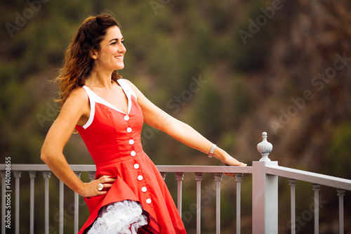 beautiful happy girl in dress in Spain for holidays and modelling