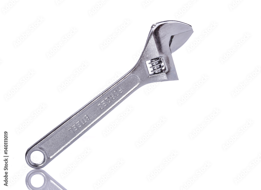New silver adjustable wrench. Studio shot isolated on white New silver adjustable wrench. Studio shot isolated on white