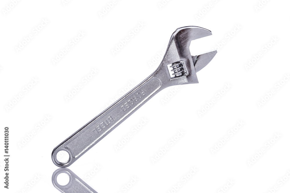 New silver adjustable wrench. Studio shot isolated on white New silver adjustable wrench. Studio shot isolated on white