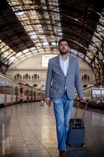 Businessman at the train station © OSORIOartist