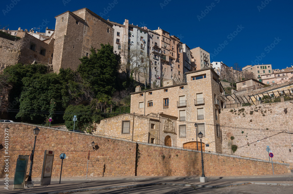 View to houses  of Cuenca old town. Outstanding example of a medieval city, built on the steep sides of a mountain. Many huses  are built right up to the cliff edge. Cuenca, Spain