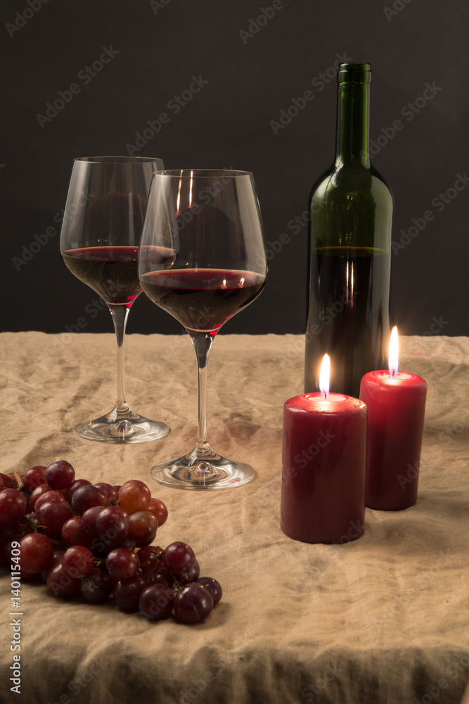 Bottle of wine and two glasses on the table. Romantic concept